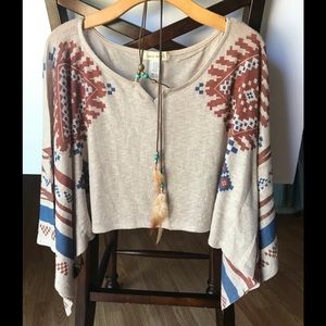 Sans Souci overlay w/ bead & feather tassels.